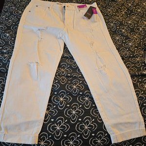 Distressed white jeans